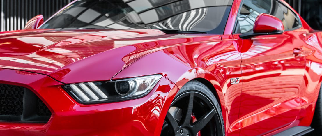sparkling clean red ford mustang